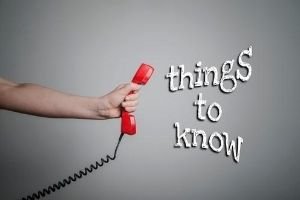 holding a red phone